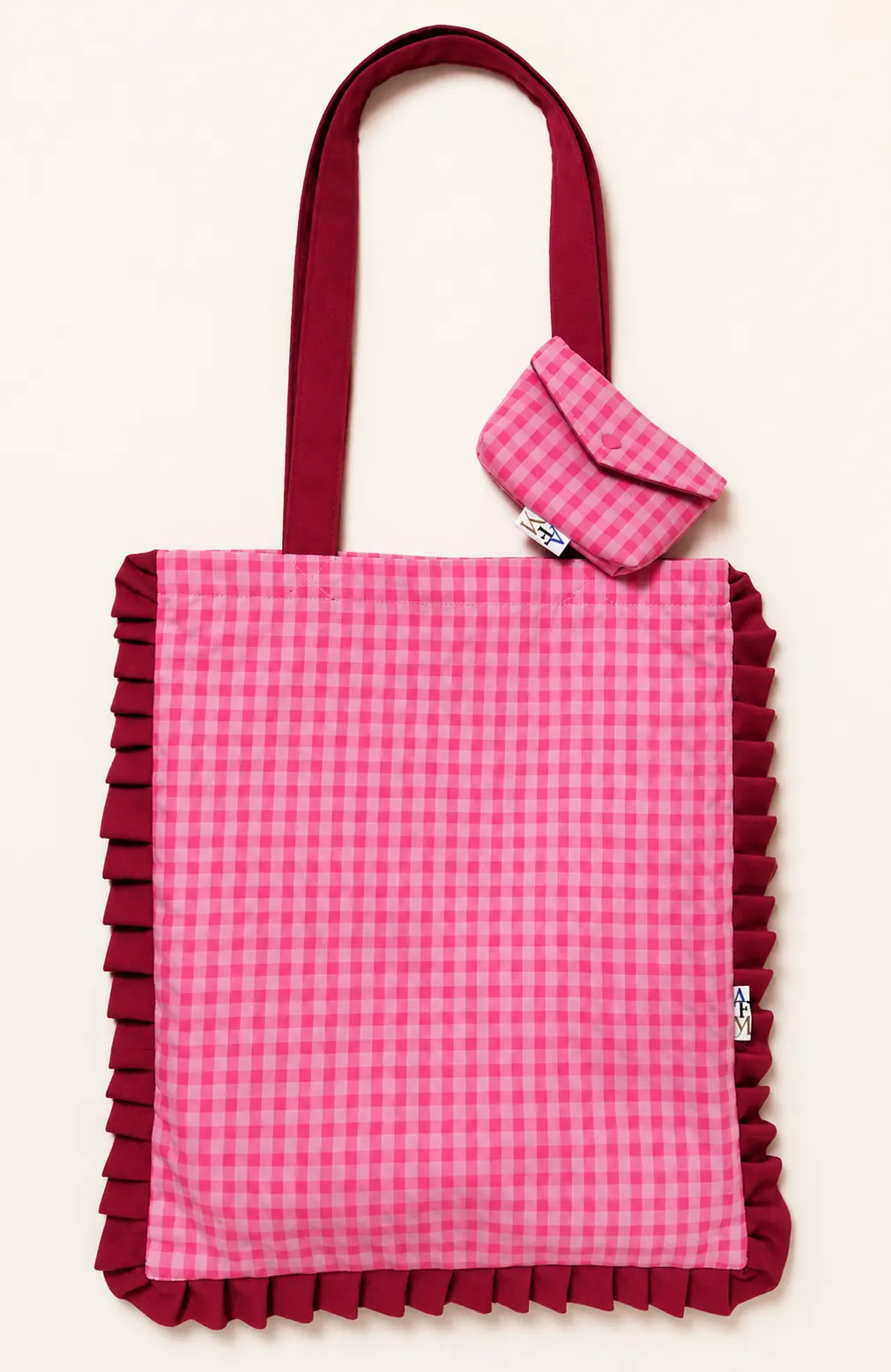 Bolso con volante y monedero a juego